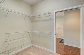 the walk in closet at the chancellor apartments at Residences at the Street, Washington, 15301